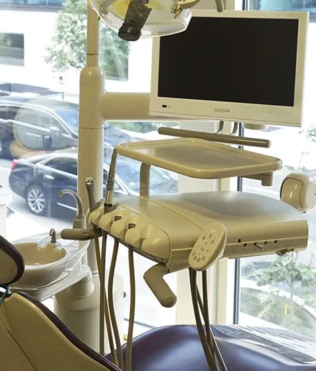 A treatment chair with a chairside monitor at Davidson Dental Associates.